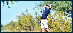 A men's golf student-athlete in a full back swing