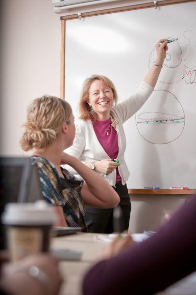 instructor at white board